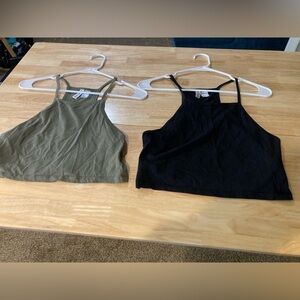 4/$25 Set of Divided brand tank tops in size medium. 1 green & 1 black.